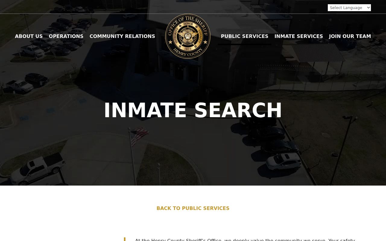 Official Henry County inmate search page distinguished from a Stockbridge neighbor lookup